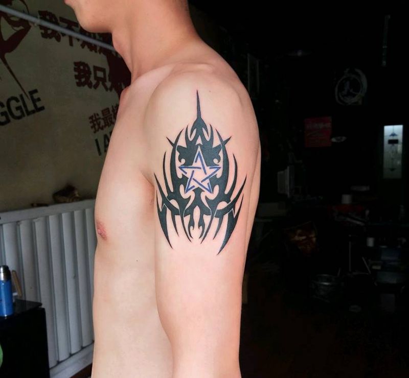 大臂图腾纹身图片_手臂纹身图案