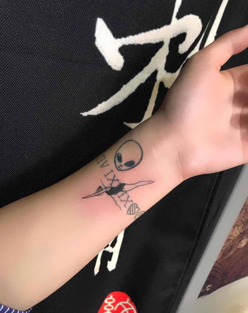 跳水纹身图片_手臂线条纹身图案