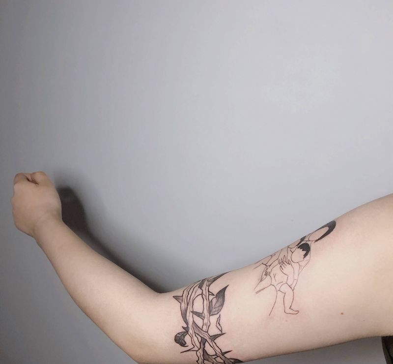 荆棘臂环纹身图片_手臂荆棘纹身图案