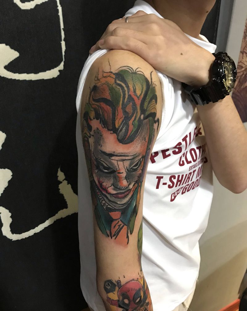 小丑纹身图片_手臂水彩纹身图案