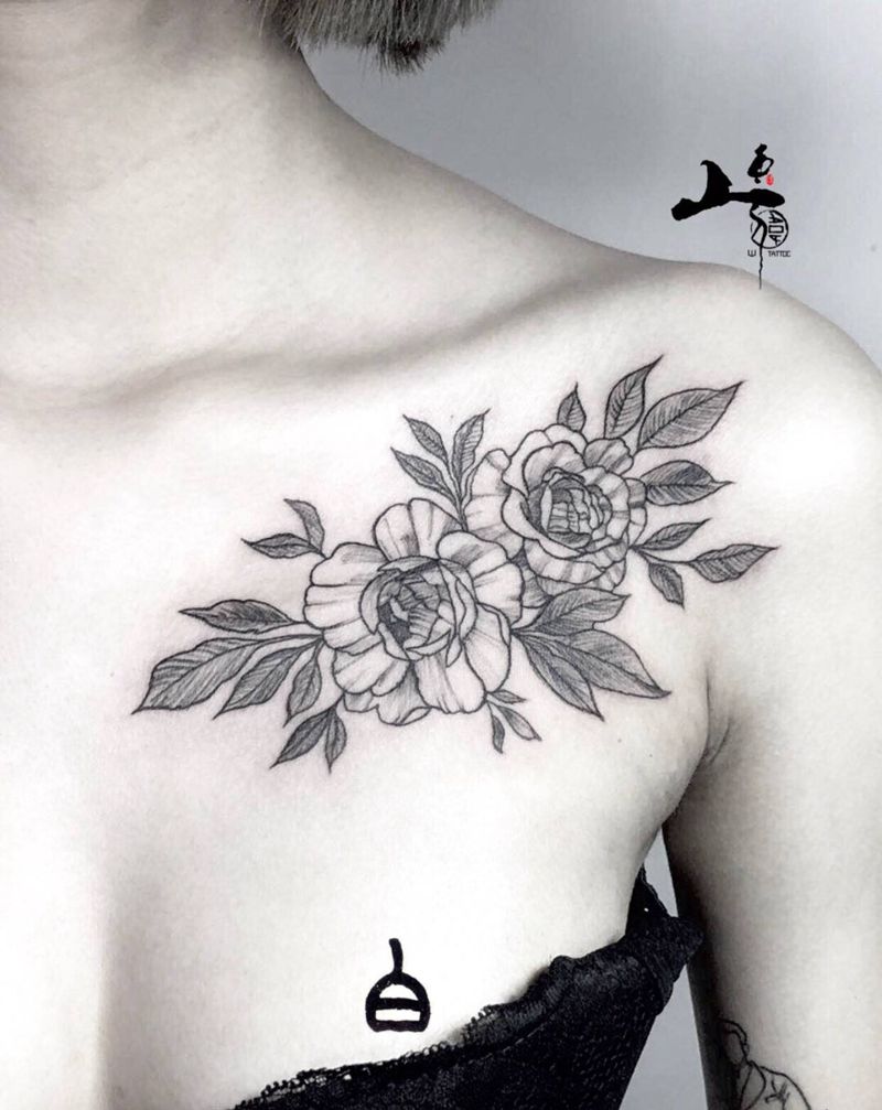 素花纹身图片_胸部纹身图案