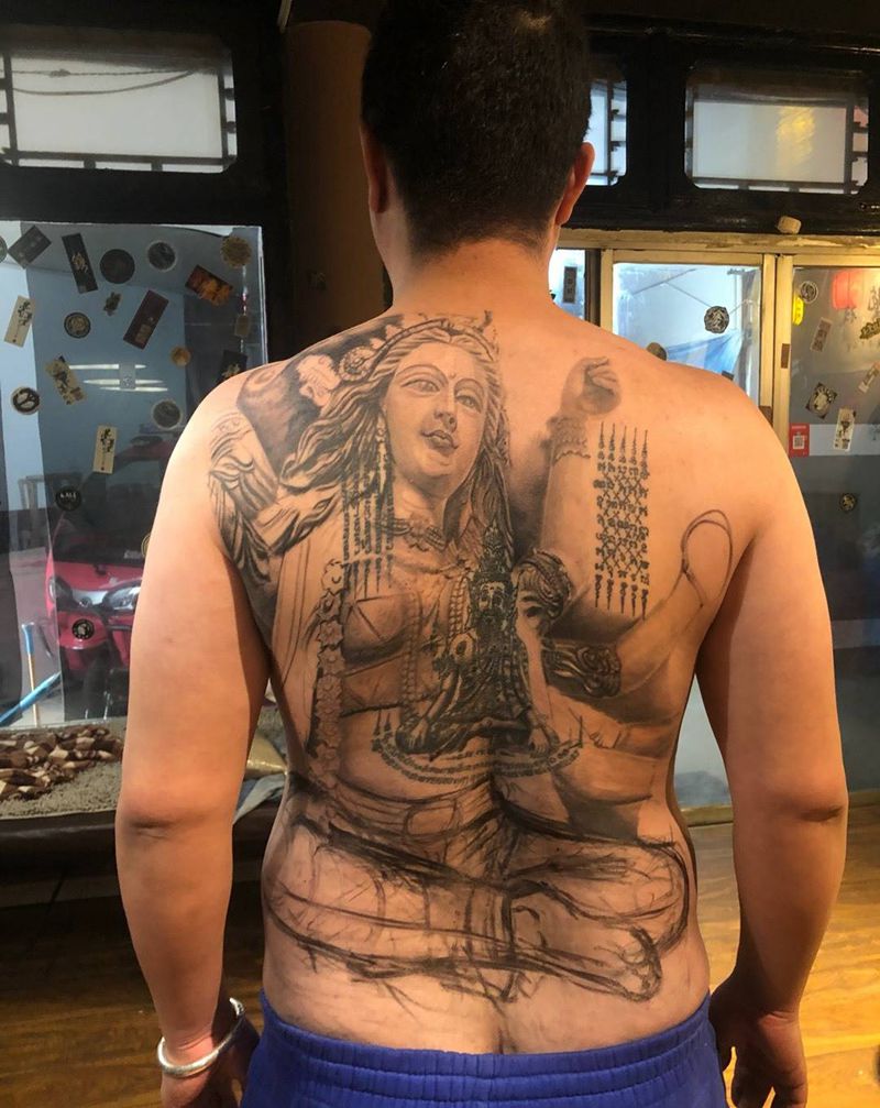 难近母    进度过半纹身图片