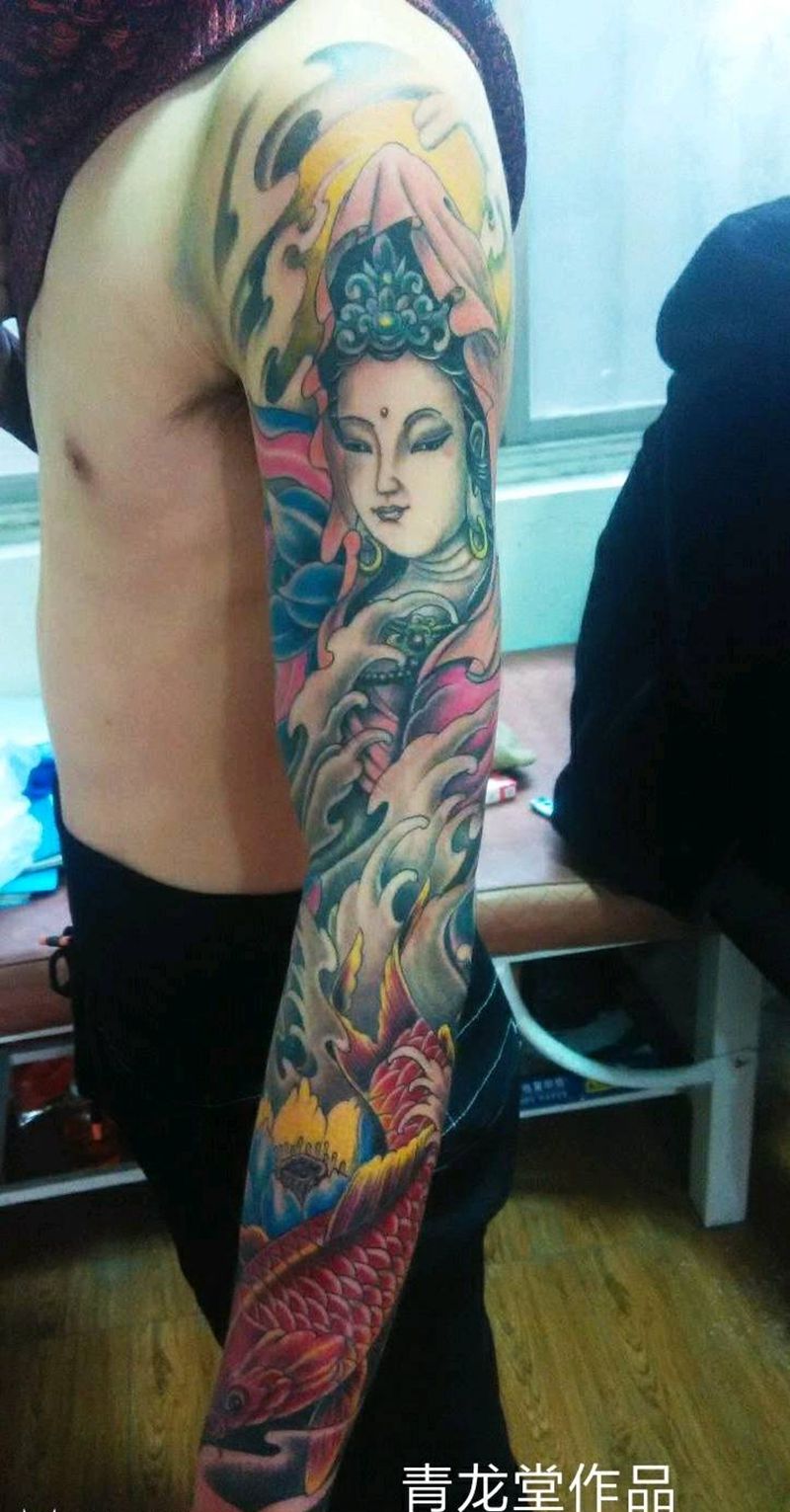 观音鱼花臂纹身图片