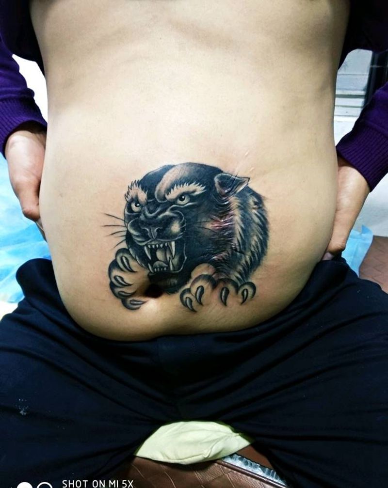 黑豹盖疤纹身图片