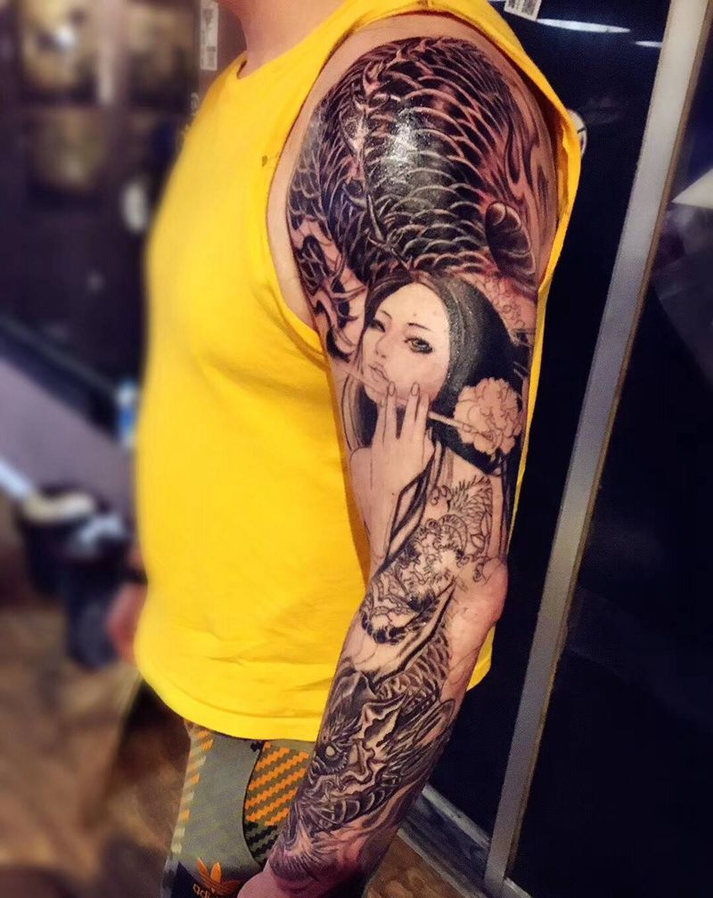 花臂纹身图片_手臂欧美传统写实人物成品纹身图案