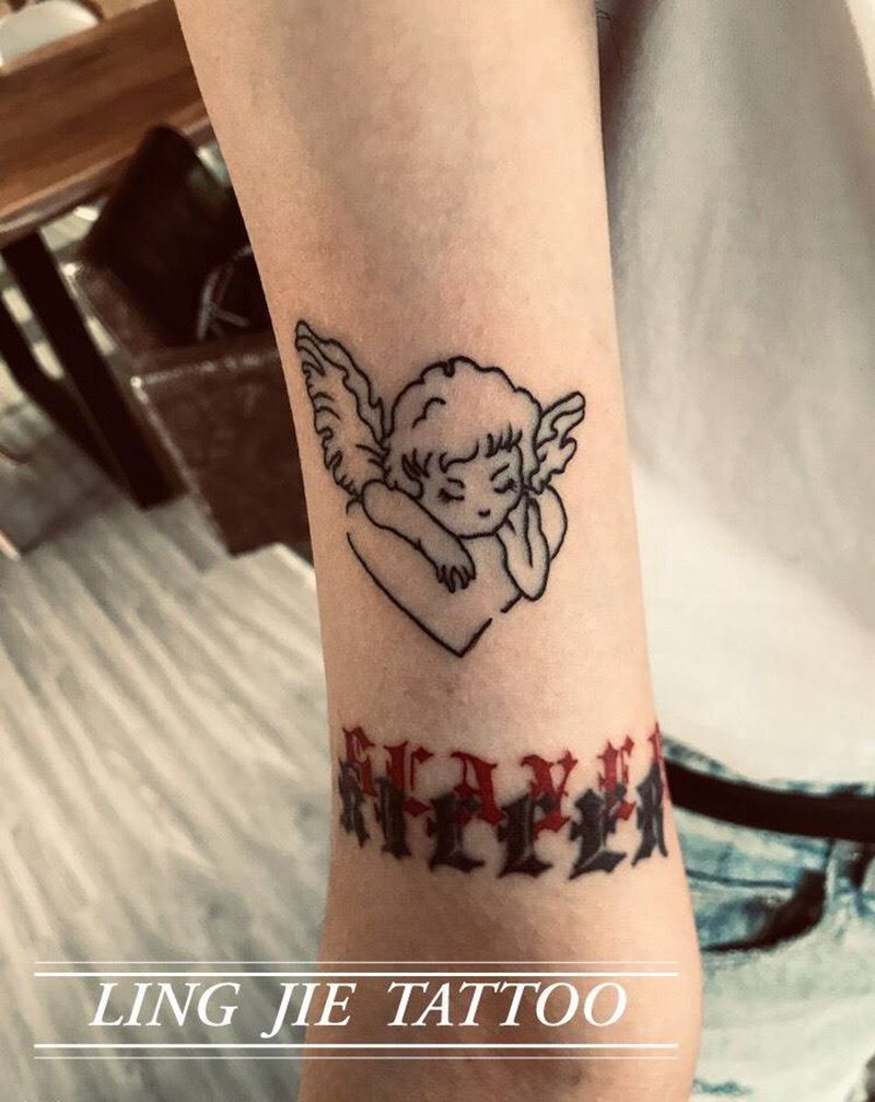 英文小天使纹身图片