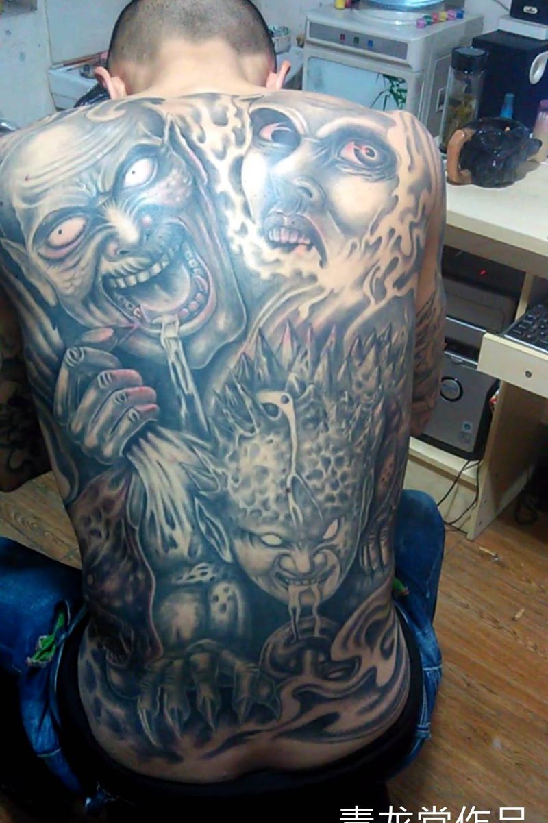后背组合纹身图片