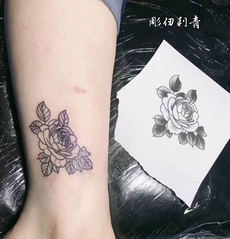 素花纹身图片_腿部纹身图案