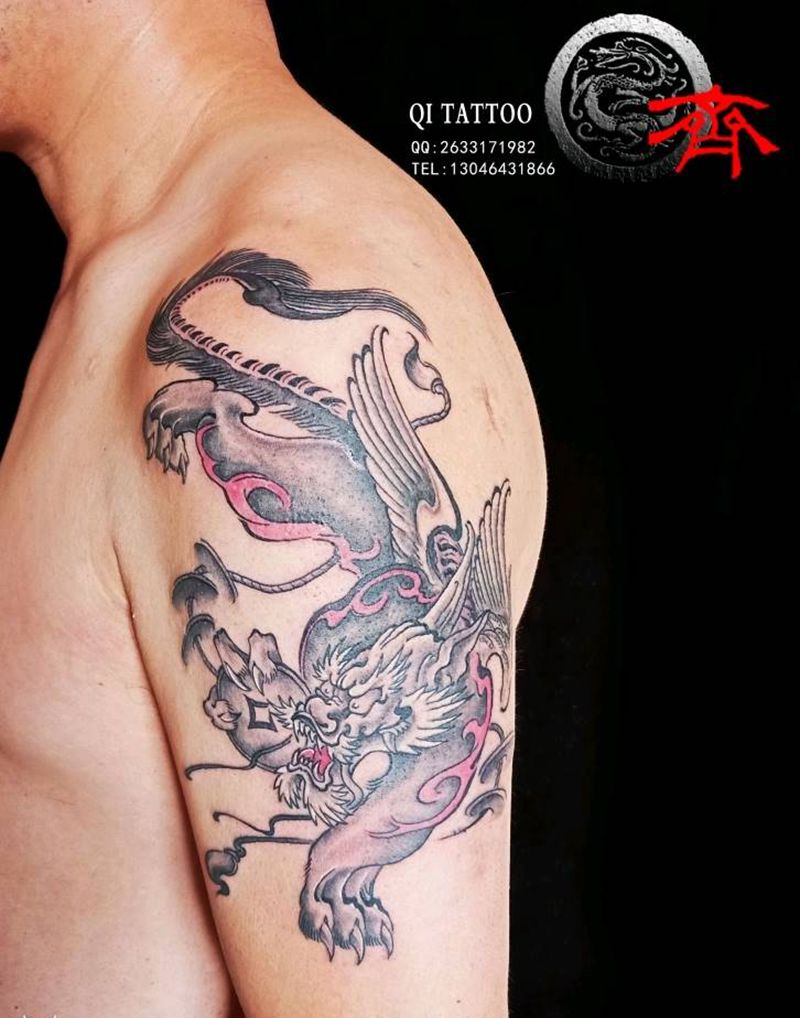 大臂貔貅纹身图片