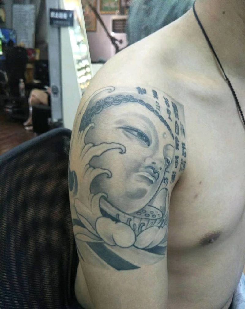 石雕佛龙花臂纹身图片_手臂纹身图案