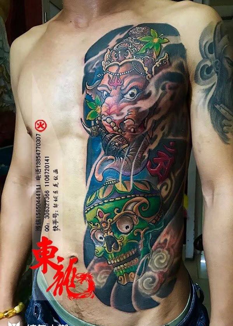 象神嘎巴拉开衫纹身图片_成品腹部传统动物人物鬼神宗教纹身图案