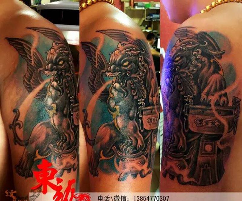 两个貔貅纹身图片_传统动物肩部纹身图案