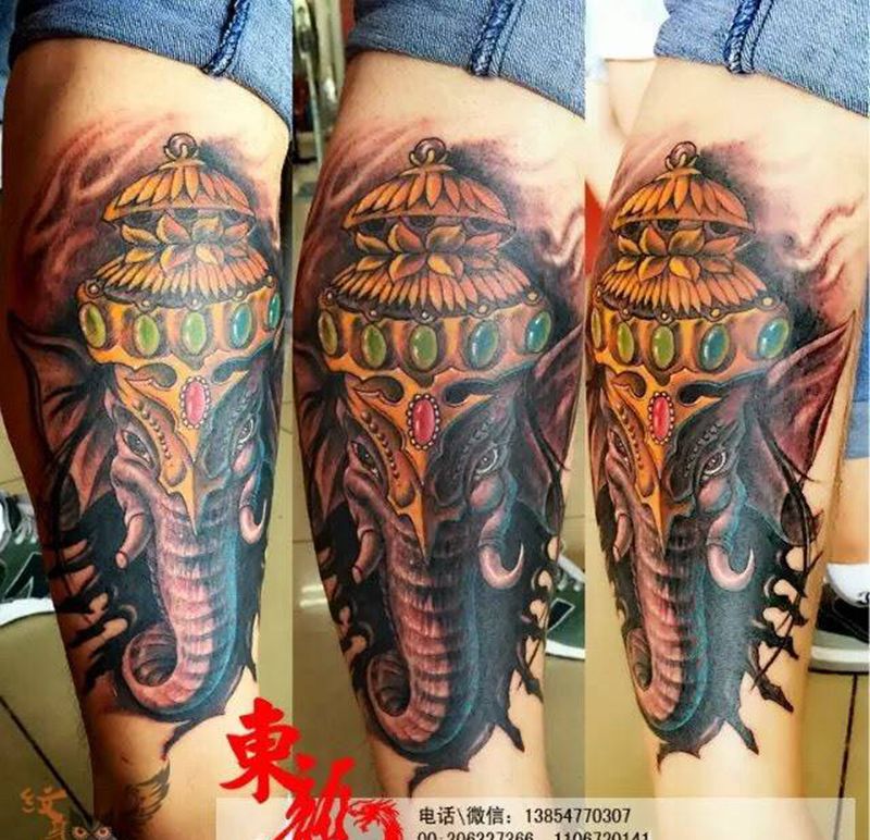 象神纹身图片_人物写实传统鬼神宗教腿部纹身图案