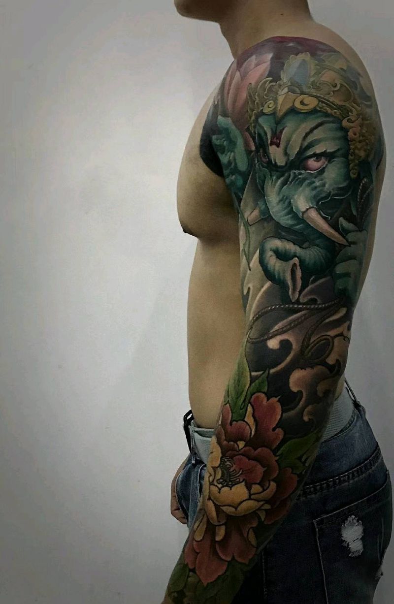 花臂象神牡丹纹身图片_手臂新传统纹身图案