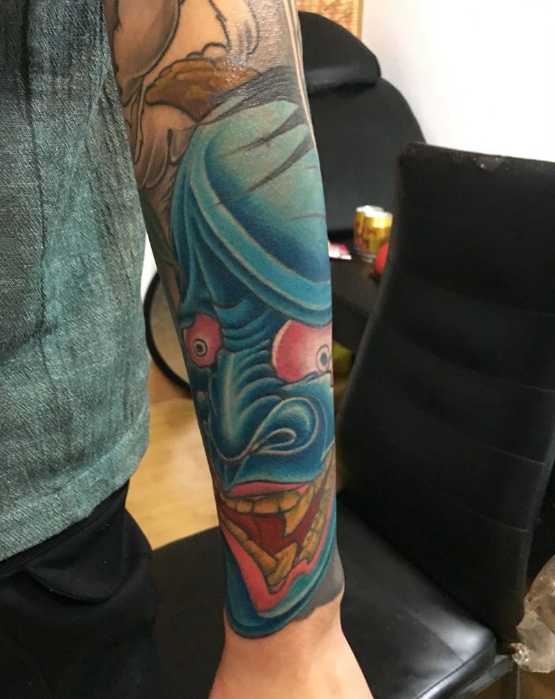 彩色花臂未完待续纹身图片_成品手臂植物鬼神纹身图案