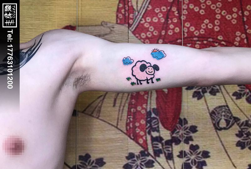节日礼物纹身图片_手臂羊纹身图案