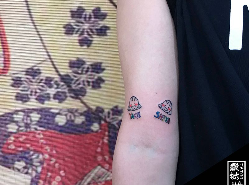 伙伴纹身图片_手臂纹身图案