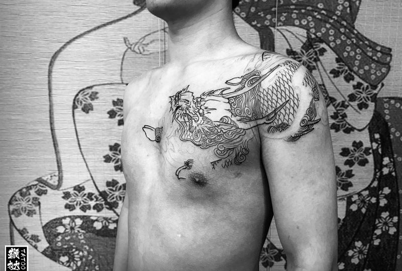 火麒麟走线完成纹身图片_肩部胸部新传统麒麟纹身图案
