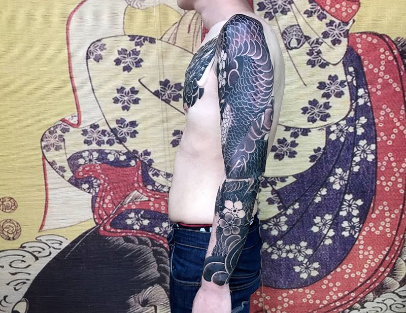 花臂过程图纹身图片_手臂新传统龙纹身图案