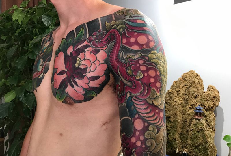 食梦貘纹身图片_胸部手臂老传统新传统食梦貘牡丹食梦兽纹身图案