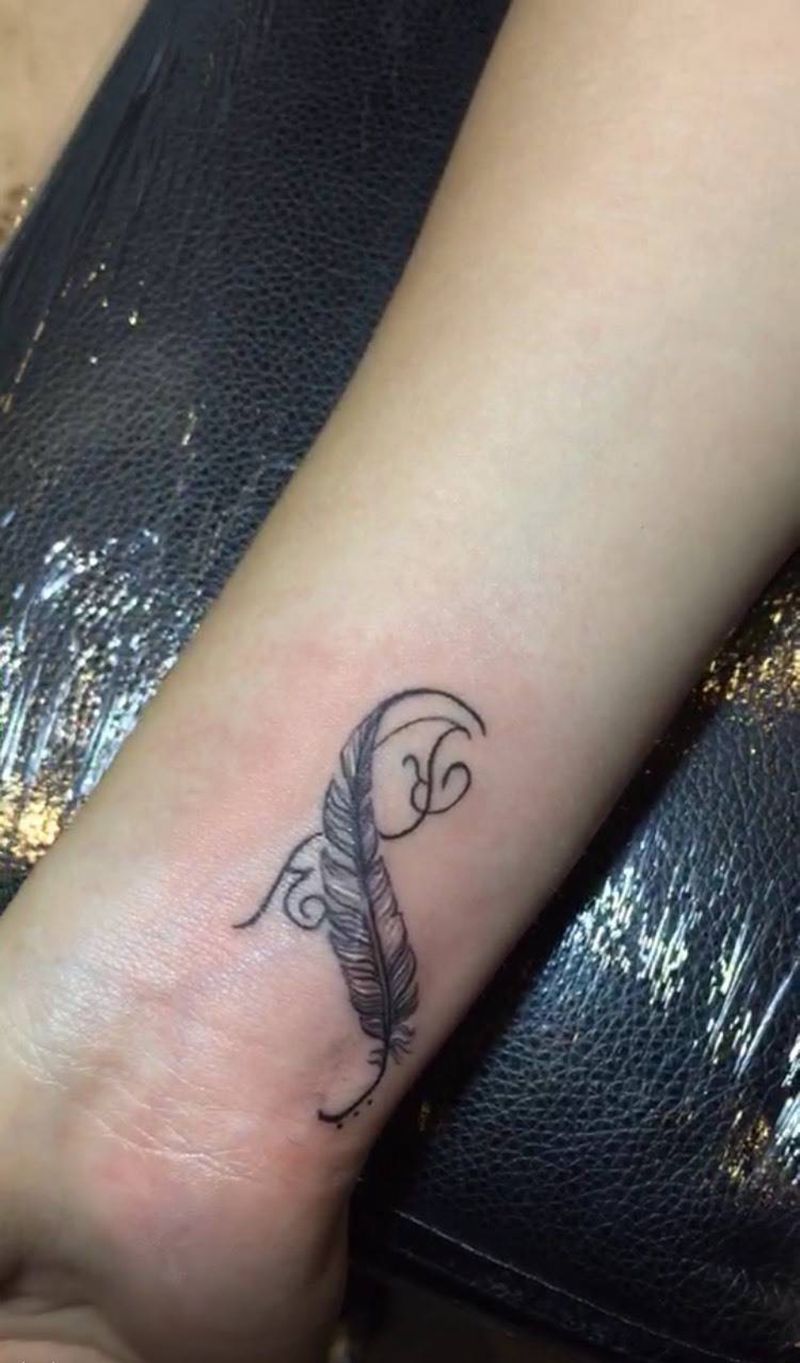 羽毛纹身图片_成品手臂传统纹身图案