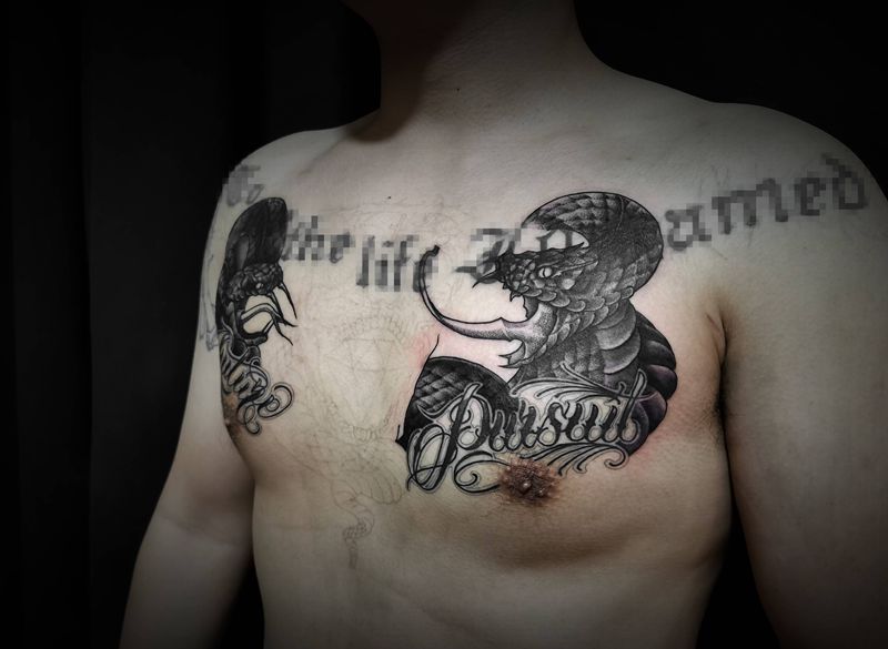 第二条纹身图片_胸部纹身图案