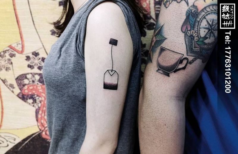 茶杯与茶袋纹身图片_手臂点刺纹身图案