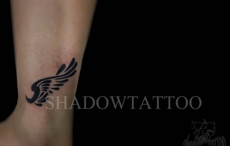 纯色小清新纹身图片_成品清新图腾腿部纹身图案