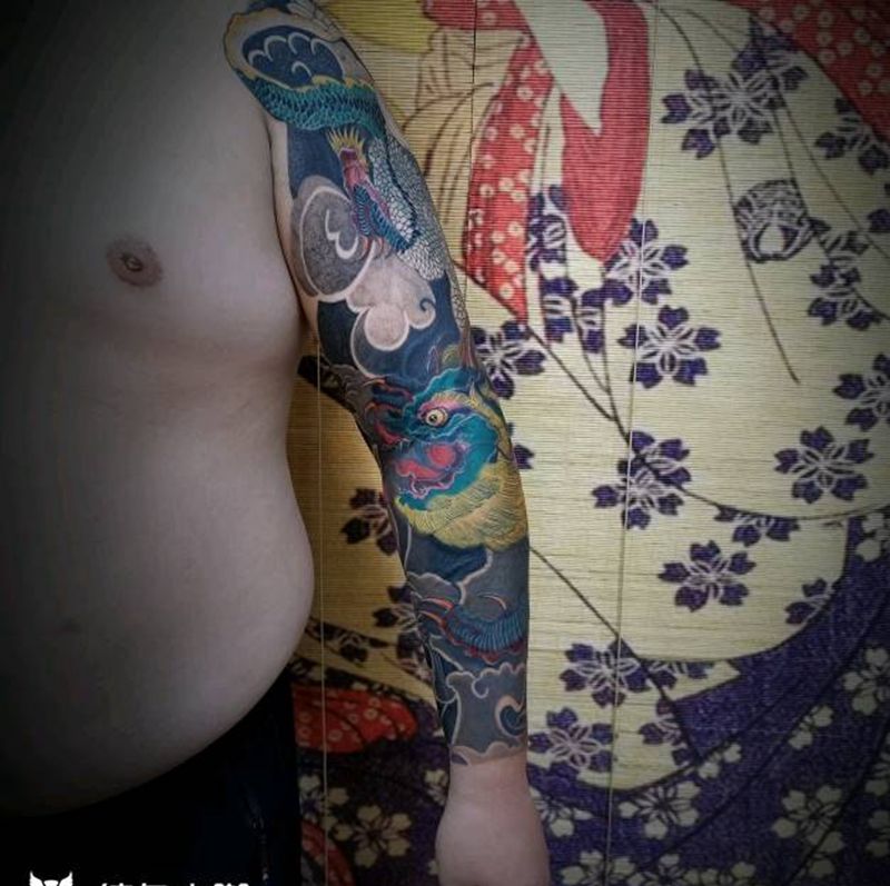 进度纹身图片_手臂新传统碧水金晶兽纹身图案