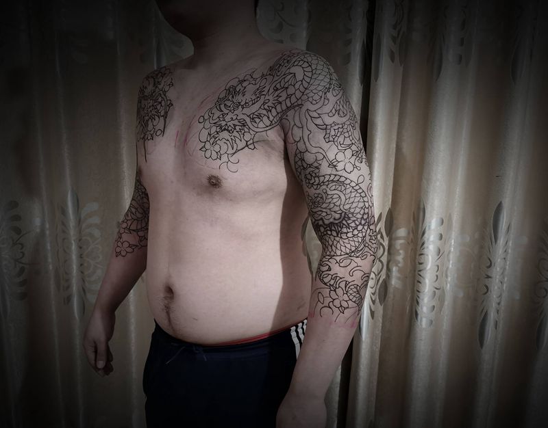 七分双龙半甲(第一回合)纹身图片_手臂胸部老传统纹身图案