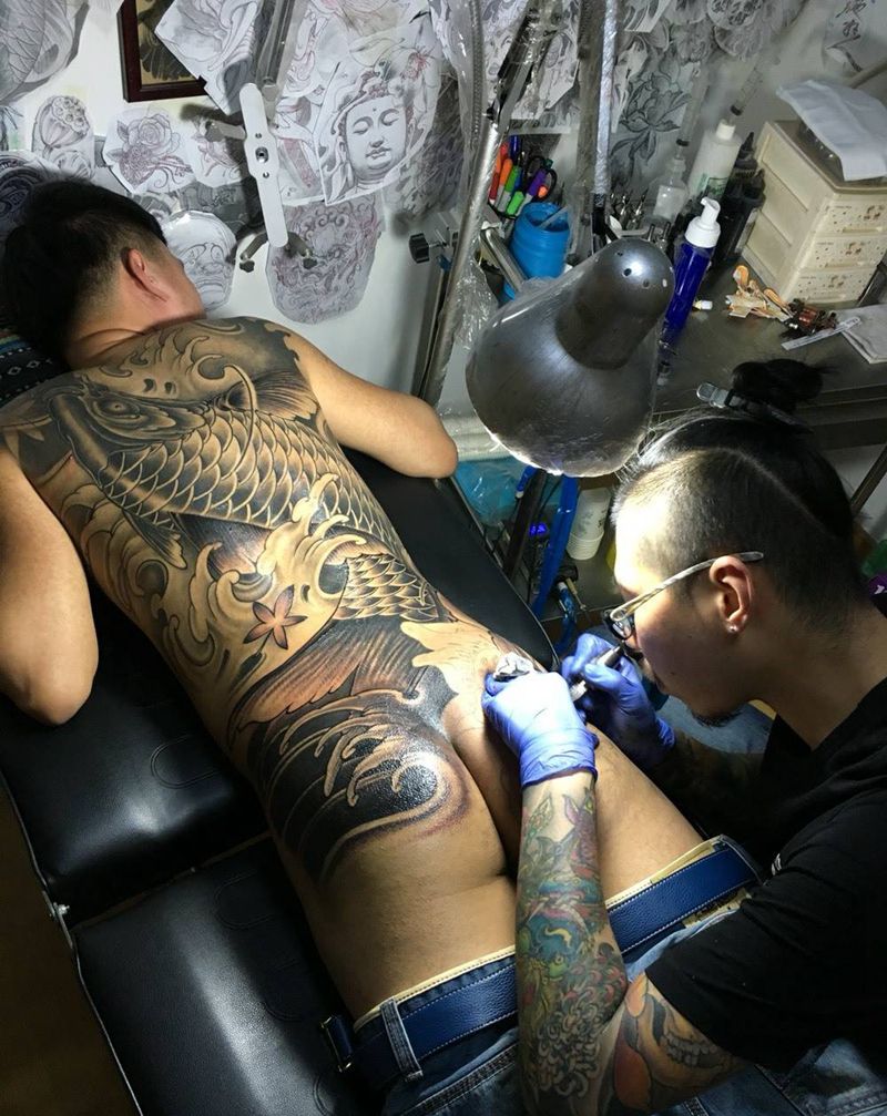 工作照纹身图片_背部传统动物原创纹身图案