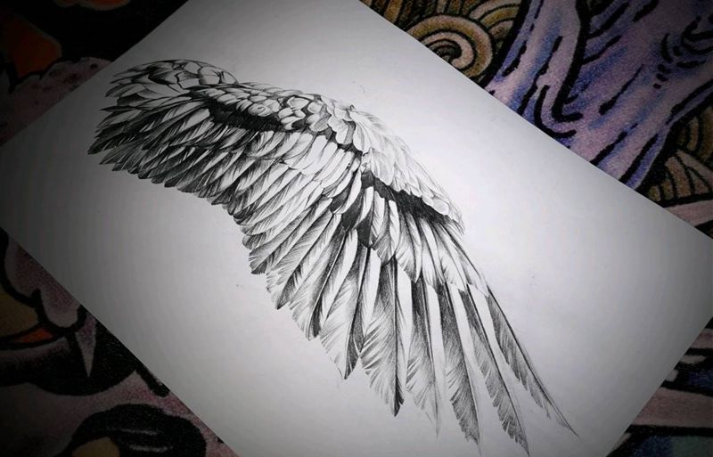 手稿纹身图片_肩部手臂翅膀纹身图案