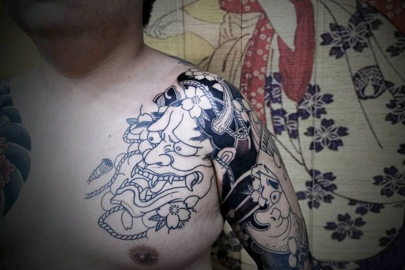 板雾篇纹身图片_手臂老传统生首纹身图案