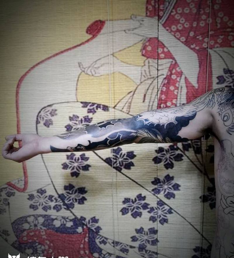 凤凰臂板雾部分结束纹身图片_手臂老传统板雾纹身图案