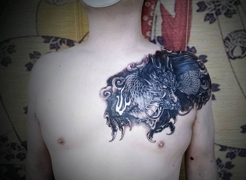 麒麟遮盖纹身图片_胸部肩部新传统麒麟纹身图案
