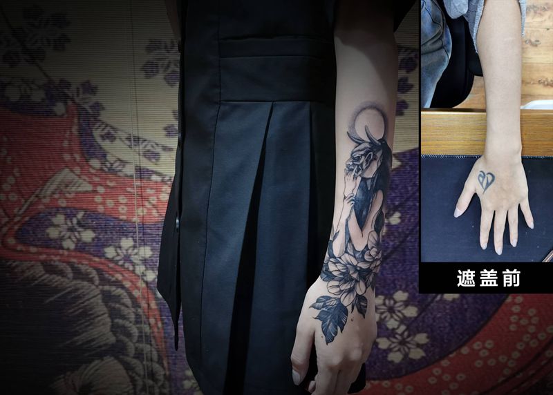 少女遮盖纹身图片_手部手臂纹身图案