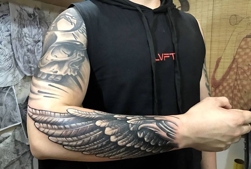 追求自由是人至高的心向纹身图片_成品手臂手部欧美动物纹身图案