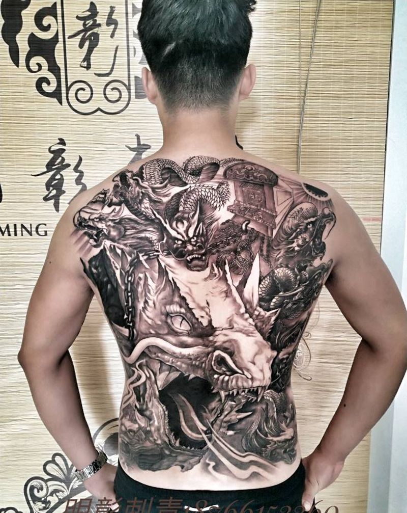 九龙拉棺纹身图片