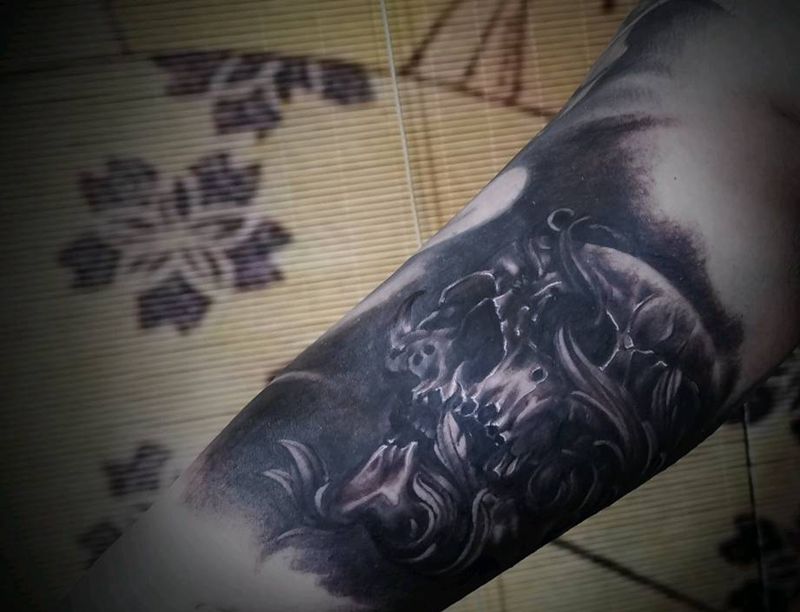 头骨纹身图片_手臂欧美写实头骨纹身图案