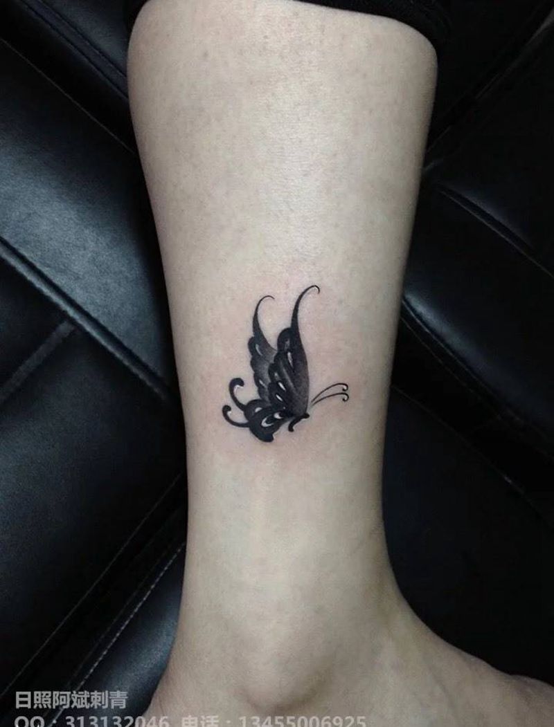 蝴蝶纹身图片_成品腿部传统动物纹身图案
