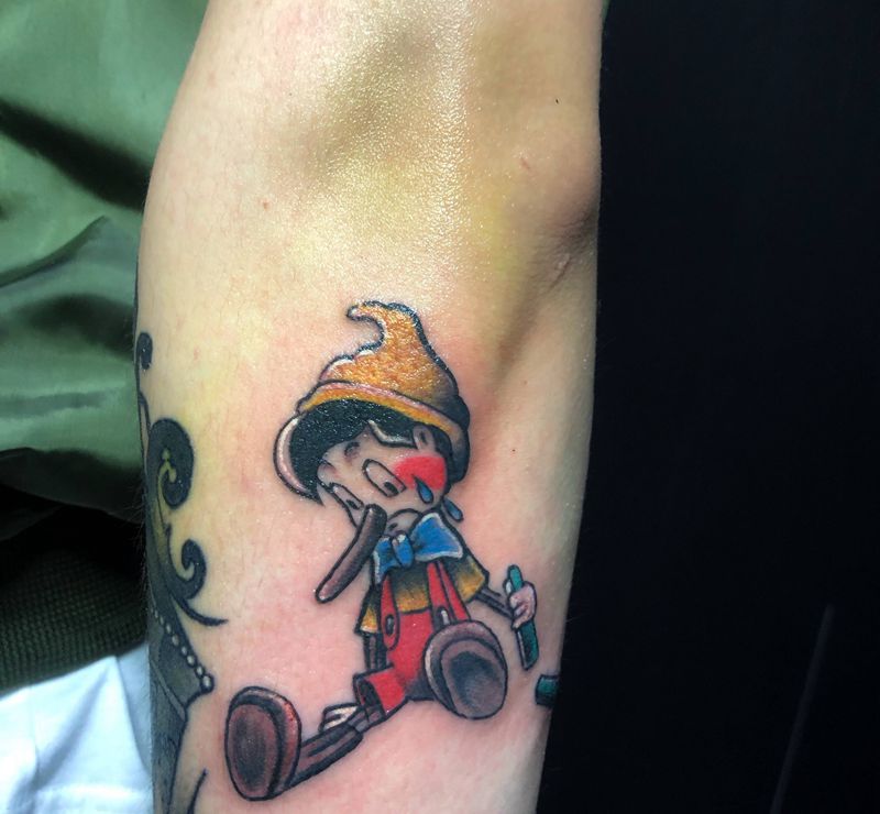 皮诺曹纹身图片_手臂Old School纹身图案