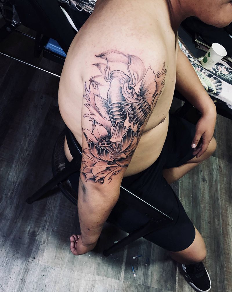 鱼纹身图片_手臂新传统鱼纹身图案