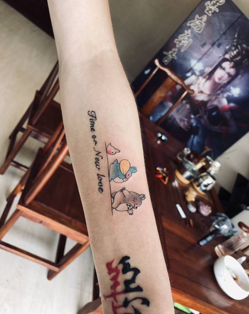 龙猫纹身图片_手臂水彩纹身图案