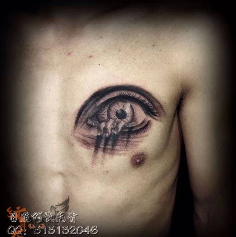 眼睛纹身图片_胸部传统人物纹身图案