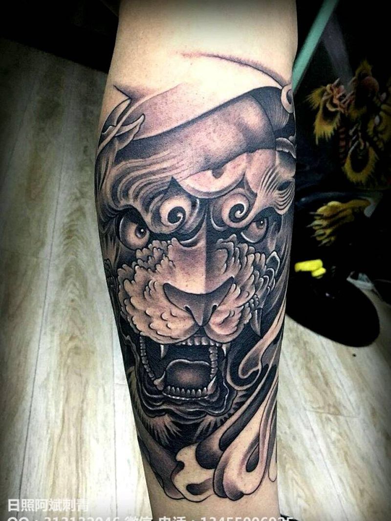 唐狮纹身图片_腿部传统动物成品纹身图案