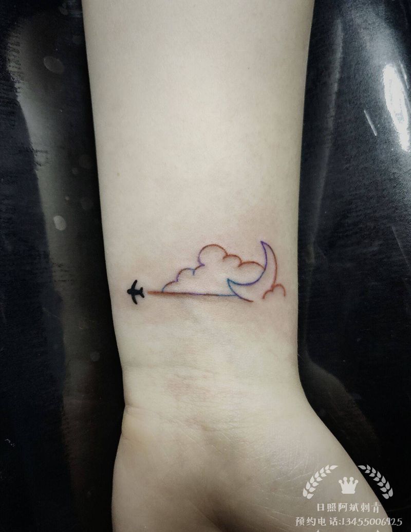 云纹身图片_手臂水彩纹身图案