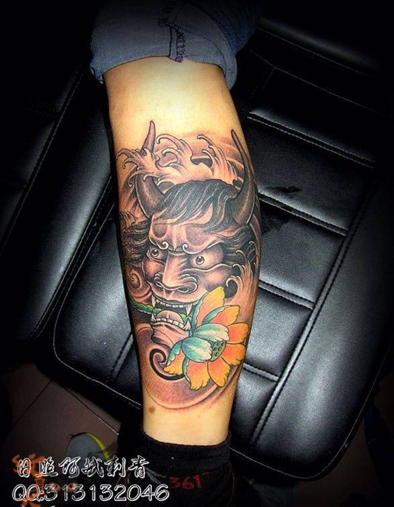 班诺纹身图片_腿部传统鬼神纹身图案