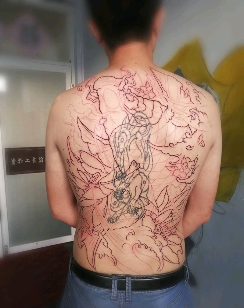 满背鲤鱼遮盖纹身图片