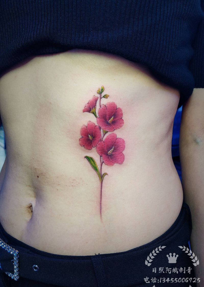 花纹身图片_腹部新传统纹身图案