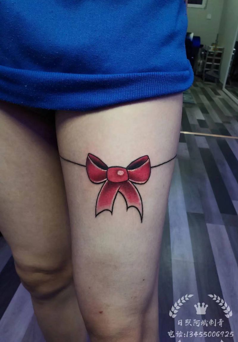 蝴蝶结纹身图片_腿部新传统纹身图案